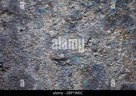 Rough metal texture backround, uneven molten metallic surface Stock Photo