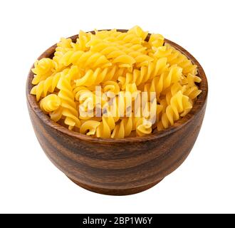 Fusilli pasta in wooden bowl isolated on white background Stock Photo