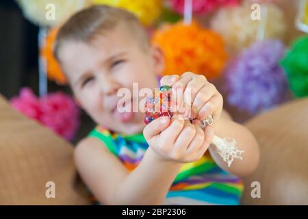 Boy with anti stress ball Stock Photo