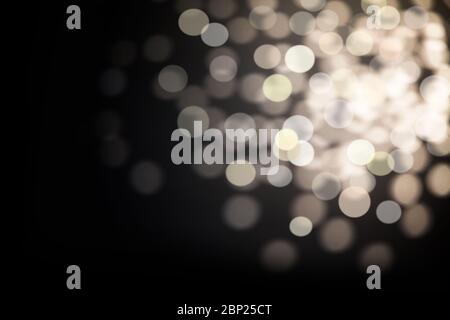 Dark Abstract silver bokeh sparkle on black background Stock Photo
