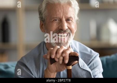 Portrait of laughing positive middle aged retired disabled man. Stock Photo