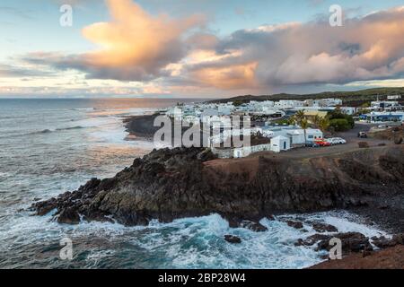 Sunset over the village of El Golf on the west coast of Lanzarote, Canary Islands, Spain Stock Photo