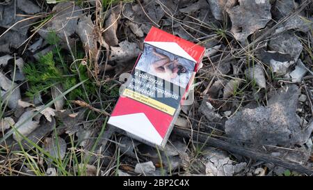 Gyor Hungary 03 31 2020: Smoking increases the risk of impotence inscription on a cigarette box. Stock Photo