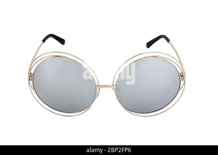 Cat eye sunglasses with silver colored lenses and silver colored oval shaped metal frames isolated on white background, front view. Stock Photo