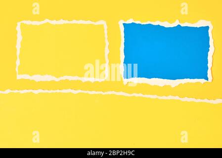 Two ripped paper torn edge sheets on yellow background. Template with piece of color paper Stock Photo