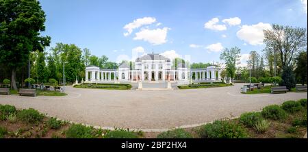 Panoramic ultrawide distorted image of old baroque casino building in Central Park of Cluj-Napoca, Romania Stock Photo