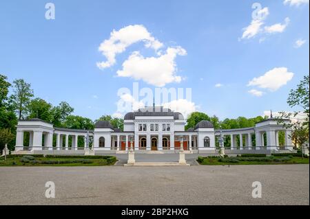 Imposing and serious image of old baroque casino building in Central Park of Cluj-Napoca, Romania Stock Photo