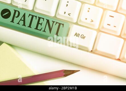 Conceptual hand writing showing Patent. Concept meaning government authority or licence conferring a right or title Stock Photo