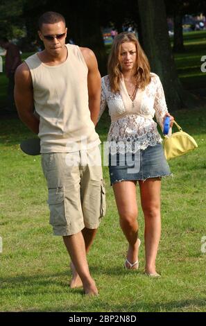 Singer Charlotte Church and boyfriend Kyle Johnson enjoy a day out in the sunshine in Victoria Park, Cardiff this afternoon. ( Sunday 1/8/04). Stock Photo