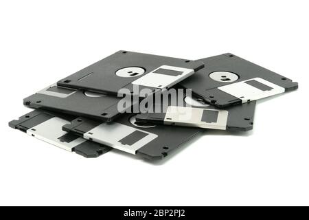 Stack of vintage floppy drives (Isolated on white background) Stock Photo