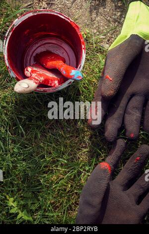 Top view image of old empty paint can and used paint brushes Stock Photo