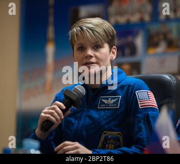 Expedition 58 Press Conference  Expedition 58 Flight Engineer Anne McClain of NASA, answers a question during a press conference, Sunday, Dec. 2, 2018 at the Cosmonaut Hotel in Baikonur, Kazakhstan. Launch of the Soyuz rocket is scheduled for Dec. 3 and will carry McClain, Soyuz Commander Oleg Kononenko of Roscosmos, and Flight Engineer David Saint-Jacques of the Canadian Space Agency (CSA) into orbit to begin their six and a half month mission on the International Space Station. Stock Photo