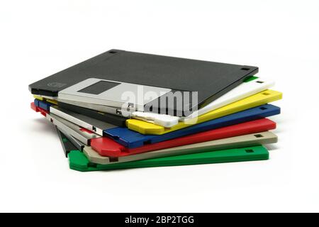Stack of vintage floppy drives (Isolated on white background) Stock Photo