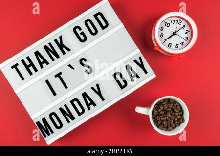 The text on the Lightbox, thank God it's Monday day is on a red background. Stock Photo