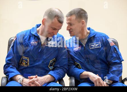 Expedition 59 Press Conference  Expedition 59 astronaut Nick Hague of NASA, left, and backup crewmember Drew Morgan of NASA are seen during a press conference, Wednesday, March 13, 2019 at the Cosmonaut Hotel in Baikonur, Kazakhstan. Hague, Koch, and Ovchinin will launch March 14, U.S. time, on the Soyuz MS-12 spacecraft from the Baikonur Cosmodrome for a six-and-a-half month mission on the International Space Station. Stock Photo