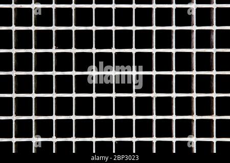 Detail of the concrete backdrop with small square holes Stock Photo