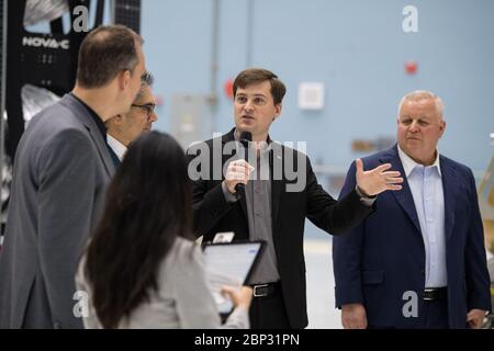 Commercial Lunar Payload Services Announcement  Astrobotic CEO, John Thornton, second from right, speaks about their lunar lander, Friday, May 31, 2019, at Goddard Space Flight Center in Md. Astrobotic, Intuitive Machines, and Orbit Beyond have been selected to provide the first lunar landers for the Artemis program's lunar surface exploration.