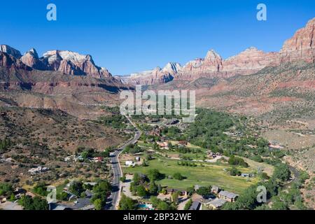 Aerial views above Springdale, Utah set in a dramatic landscape at the entrance to Zion National Park Stock Photo