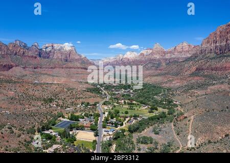 Aerial views above Springdale, Utah set in a dramatic landscape at the entrance to Zion National Park Stock Photo