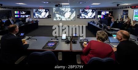 NASA Leadership and Members of Congress watch First All-Woman Spacewalk  NASA Administrator Jim Bridenstine, NASA management and members of Congess watch the beginning of the first all-woman spacewalk on Friday, Oct. 18, 2019, from the Space Operations Center at NASA Headquarters in Washington. The first all-woman spacewalk in history began at 7:38am EDT with NASA astronauts Christina Koch and Jessica Meir venturing outside the International Space Station to replace a failed battery charge-discharge unit. This is the fourth spacewalk for Koch and Meir’s first. Stock Photo