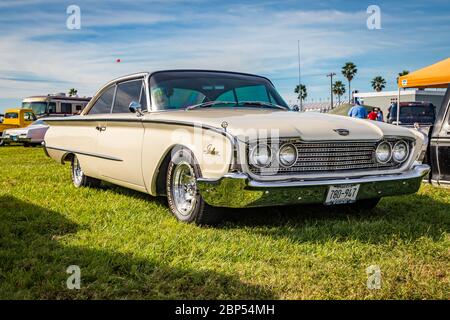 Daytona Beach, FL / USA- November 24, 2018: 1960 white Ford Starliner 2 door hardtop at the Fall 2018 Daytona Turkey Run. Stock Photo