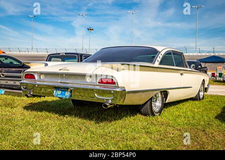 Daytona Beach, FL / USA- November 24, 2018: 1960 white Ford Starliner 2 door hardtop at the Fall 2018 Daytona Turkey Run. Stock Photo