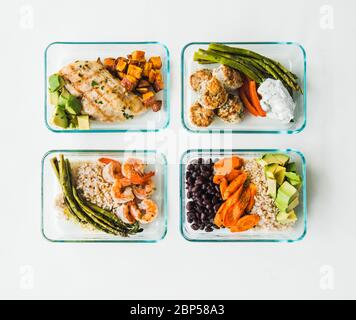 Meal prep containers filled with healthy lunches Stock Photo