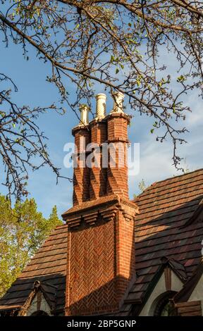 Chimney pots on the old house roof building in the 6th street  historic district of Denver, Colorado Stock Photo