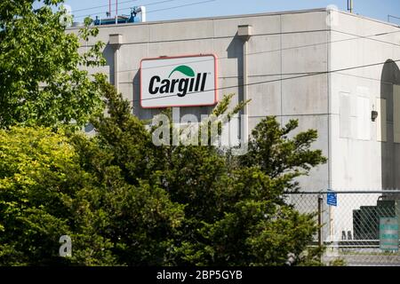 A logo sign outside of a Cargill poultry processing plant in Dayton, Virginia on May 13, 2020. Stock Photo