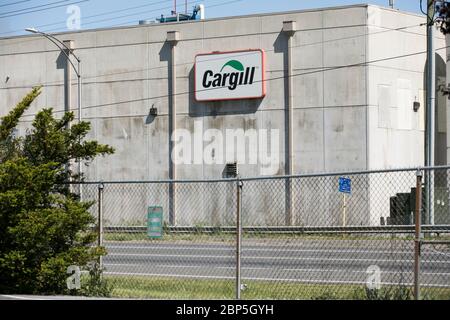 A logo sign outside of a Cargill poultry processing plant in Dayton, Virginia on May 13, 2020. Stock Photo