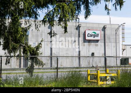 A logo sign outside of a Cargill poultry processing plant in Dayton, Virginia on May 13, 2020. Stock Photo