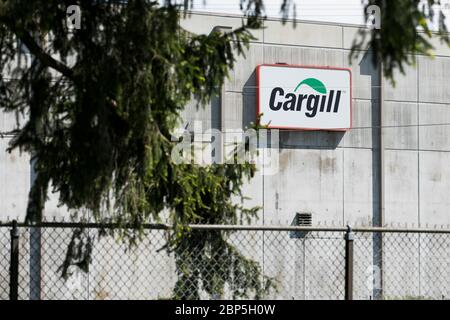 A logo sign outside of a Cargill poultry processing plant in Dayton, Virginia on May 13, 2020. Stock Photo