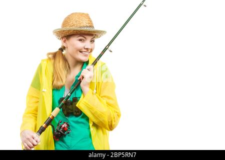 Fishery, spinning equipment, angling sport and activity concept. Woman with fishing rod. Stock Photo