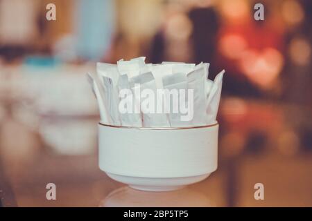 White package for sugar clipping path in the bowl Stock Photo