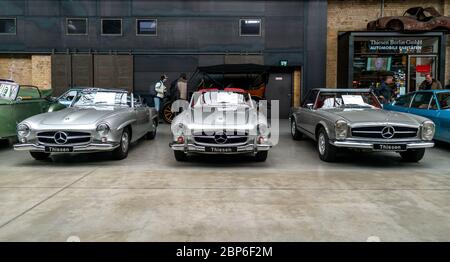 BERLIN - MAY 11, 2019: Sports cars Mercedes-Benz 190SL (left and centre) and  Mercedes-Benz 280SL (right) stand in a row . 32th Berlin-Brandenburg Oldtimer Day. Stock Photo