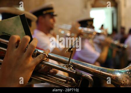 Street music band playing the trumpet during the Birgu street fest in Malta Stock Photo