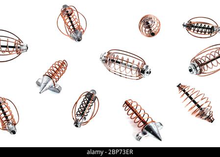 spiral cone feeders for fishing on a white background, isolate, close-up Stock Photo