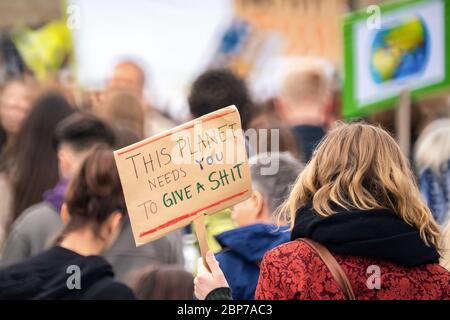 Pupils demonstrate with protest posters during the Fridays for Future climate strike at the Brandenburg Gate -Pariser Platz- in Berlin. Stock Photo