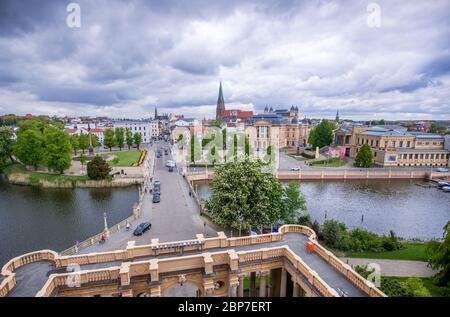 Schwerin, Germany. 13th May, 2020. View from the castle tower to the city centre of Schwerin with the state chancellery (l-r), the cathedral, the state theatre and the state museum. Credit: Jens Büttner/dpa-Zentralbild/ZB/dpa/Alamy Live News Stock Photo