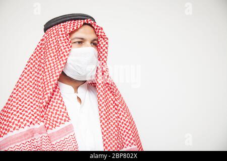 Middle Eastern Saudi Arabia Man wearing mask covid-19 Stock Photo