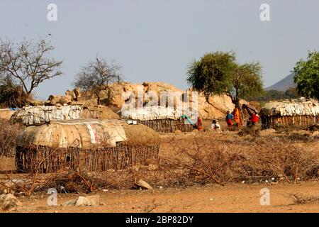 Huts and shelters in a Samburu Maasai village. Samburu Maasai is an ethnic group of semi-nomadic people Photographed in Samburu, Kenya Stock Photo