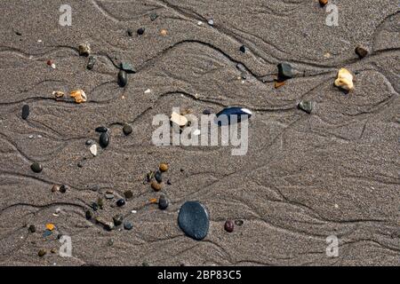 pebbles in sand Stock Photo