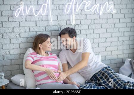 Young couple staying home and spending time together Stock Photo