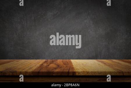 Empty wood table top on chalkboard background. Stock Photo