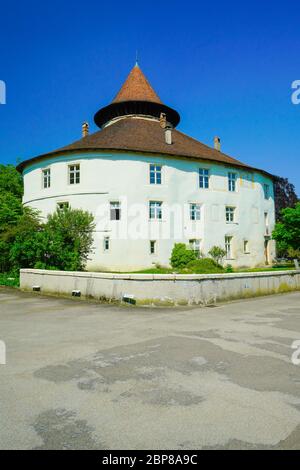 Zwingen Castle (castle- a round tower). Municipality in the district of Laufen in the canton of Basel-Country in Switzerland. Stock Photo