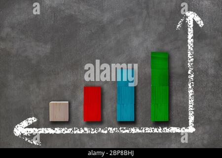 Chart of colored wooden. graph of economics growth on chalkboard ...