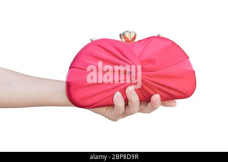 hand holding red luxury clutch bag isolated on white background. object with clipping path. Stock Photo