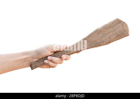 Hand holding old wooden ladle, Isolated on white background with clipping path. Stock Photo