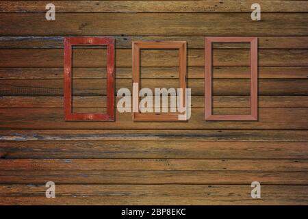 Vintage photo frames on wood wall for interior or background. Stock Photo