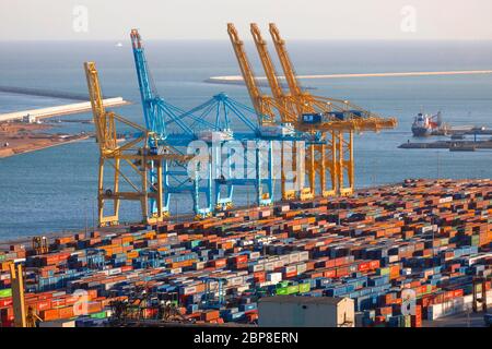 Barcelona, Spain - 02. 27. 2020 - harbour with colorful containers, cranes and sea Stock Photo